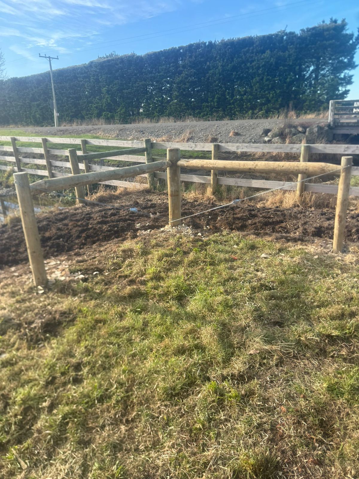 A long boundary run of stock fencing across a North Canterbury paddock